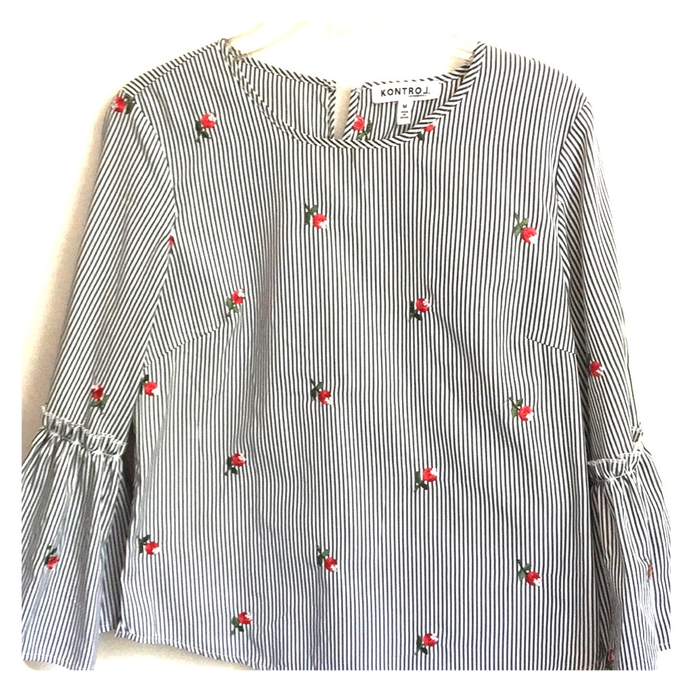 Bell sleeve embroidered top. Size medium.